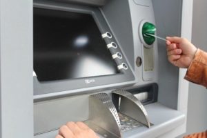 Advantages & Disadvantages of ATM Automated teller machine